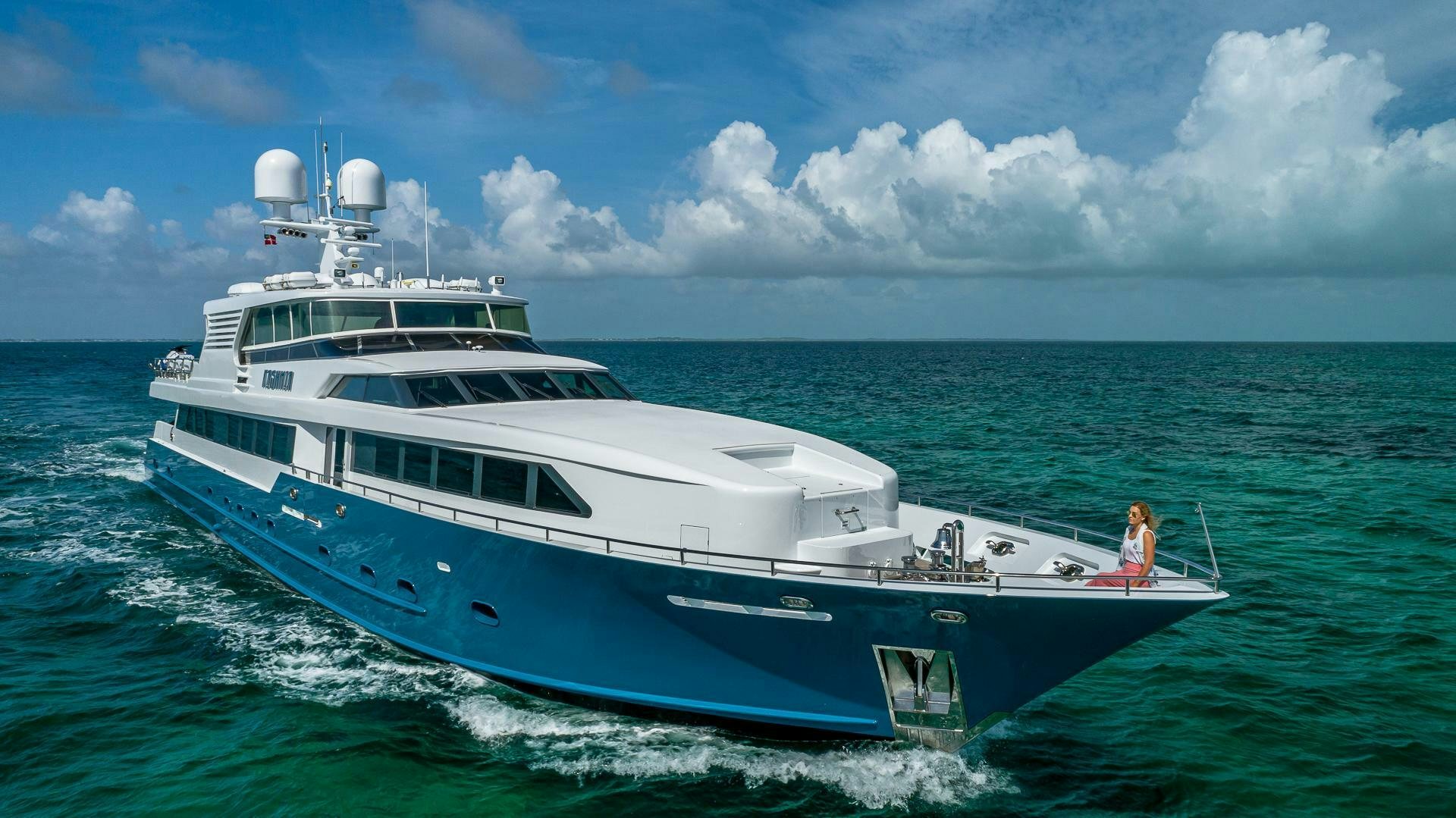 a large white boat in the water aboard KASHMIR Yacht for Sale