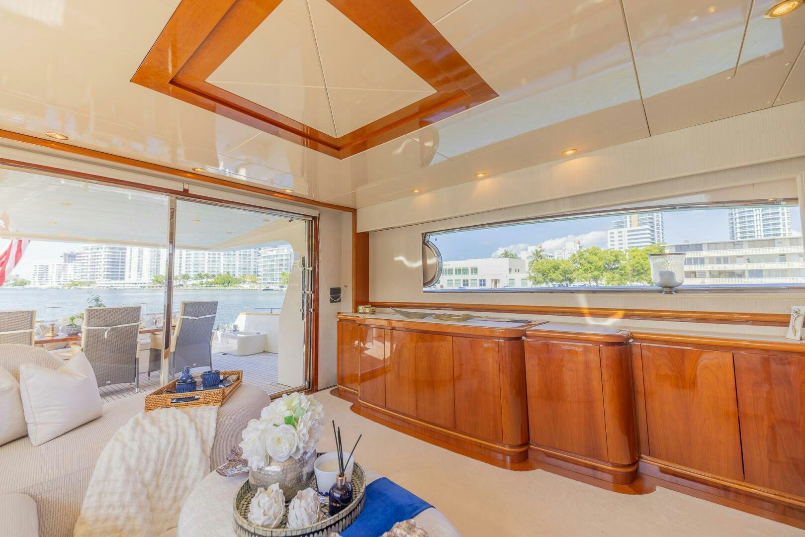 a room with a table and chairs aboard BOULOS Yacht for Sale