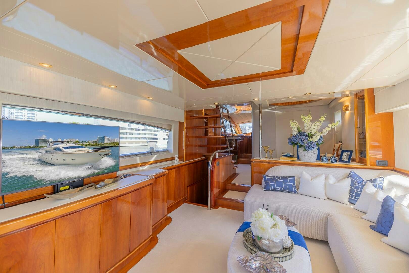 a room with a large window and a bed aboard BOULOS Yacht for Sale