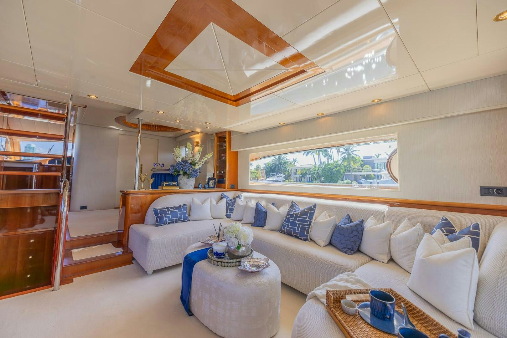 a living room with a large open window aboard BOULOS Yacht for Sale