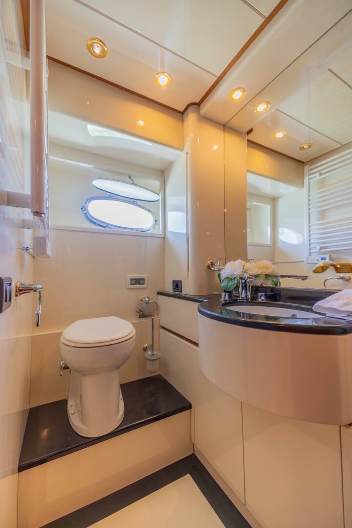a bathroom with a sink and toilet aboard BOULOS Yacht for Sale