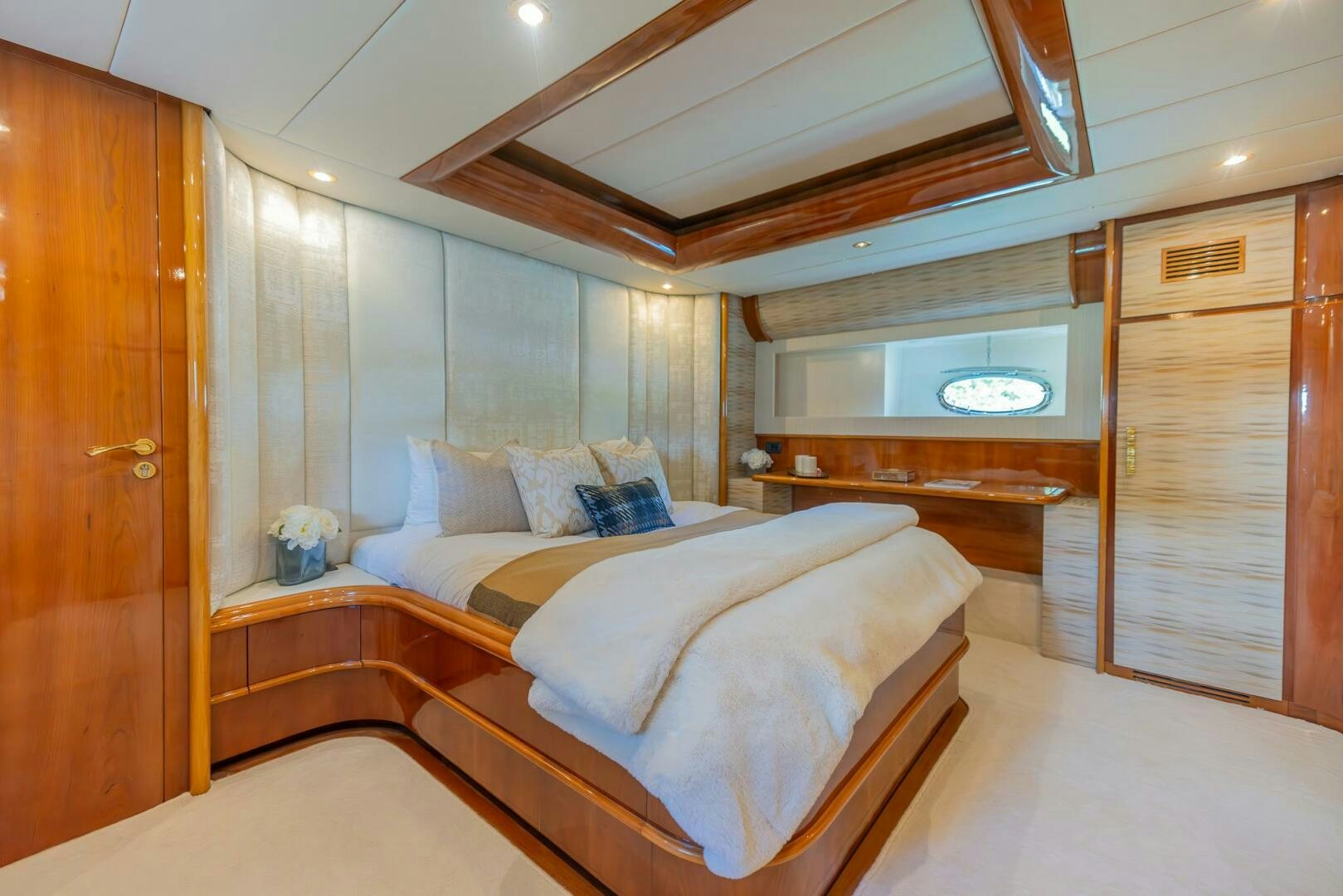 a room with a bed and a closet aboard BOULOS Yacht for Sale