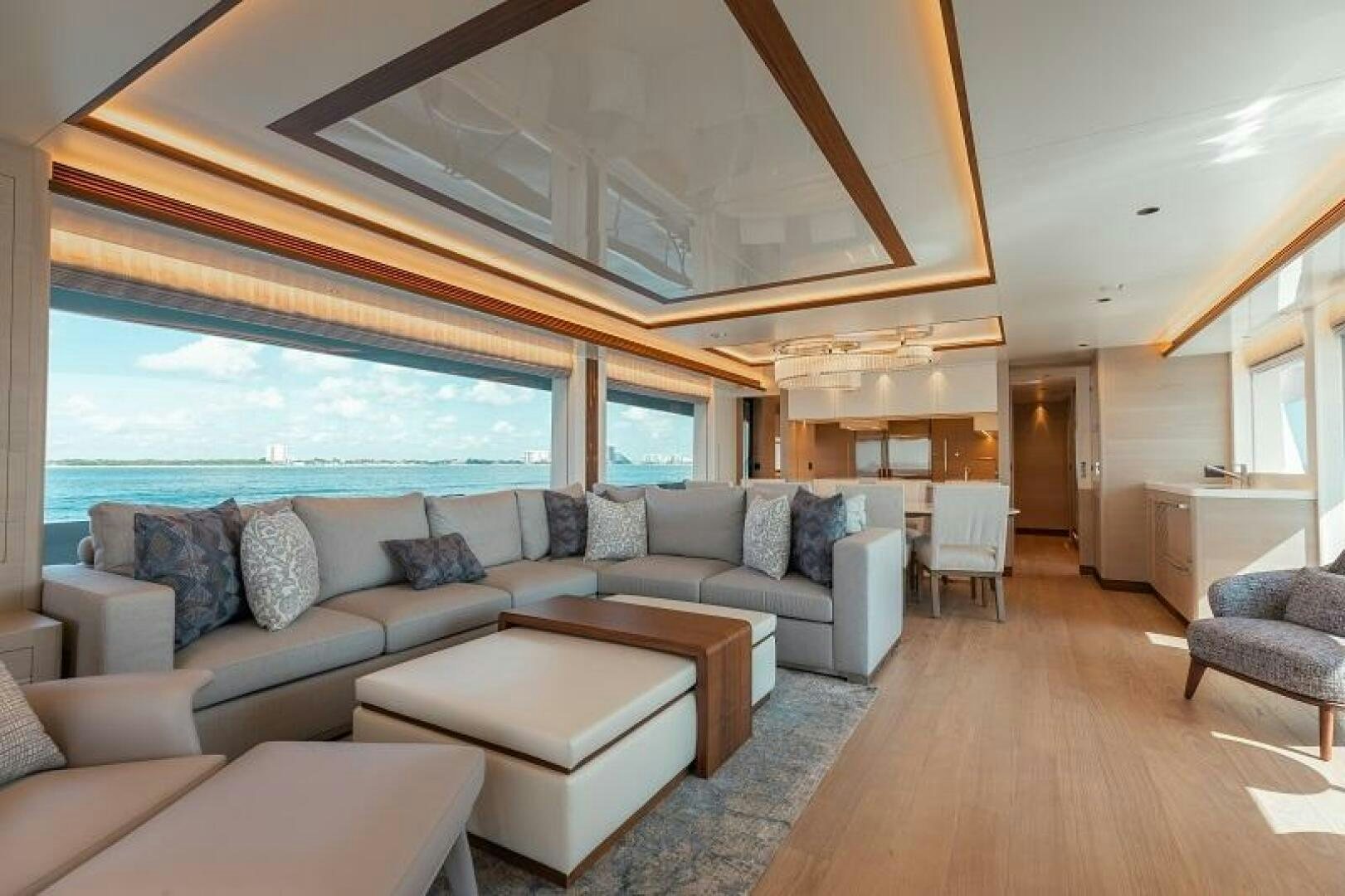 a living room with a large window aboard WIGGLE ROOM Yacht for Sale