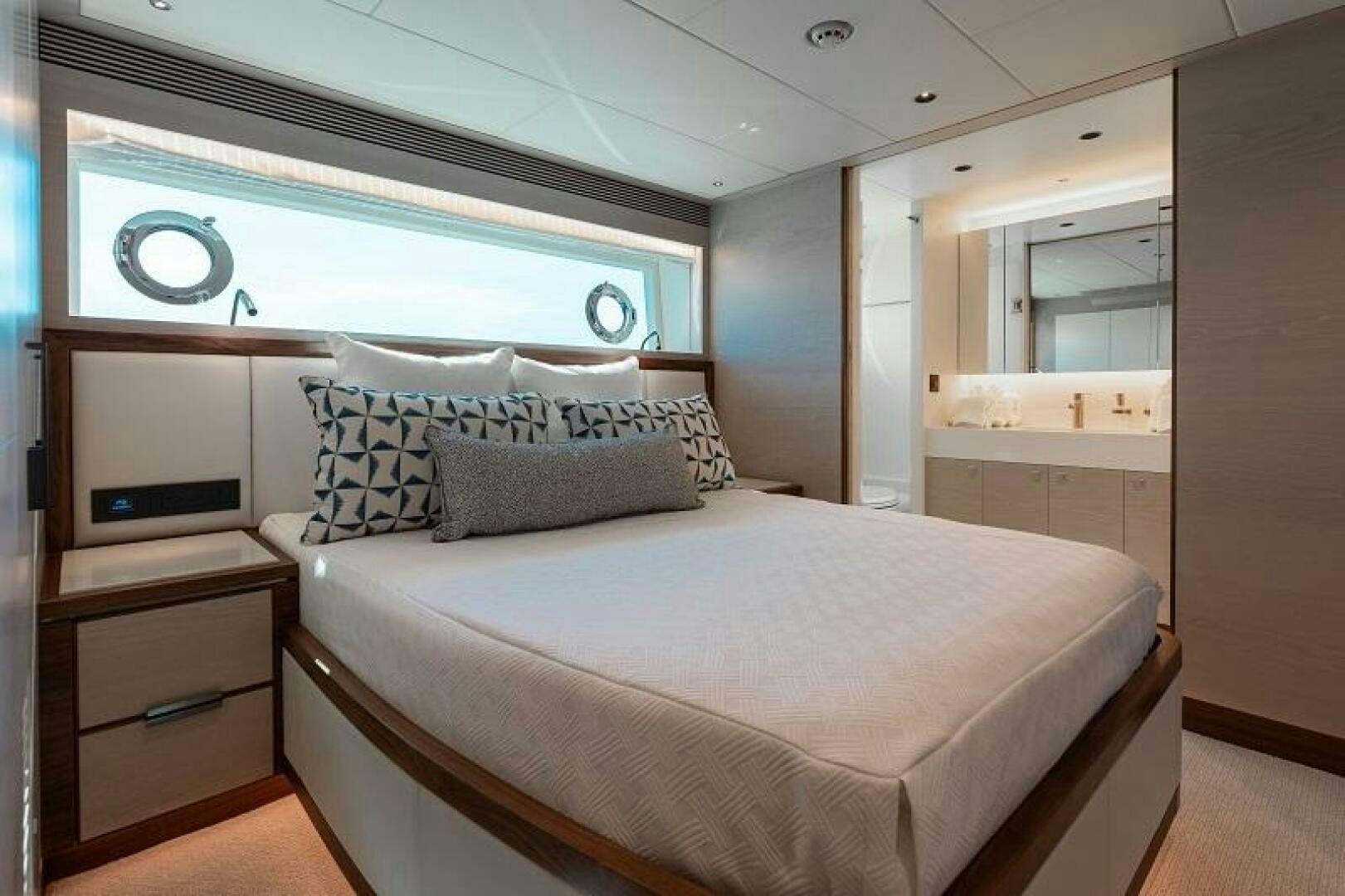 a bed in a room aboard WIGGLE ROOM Yacht for Sale