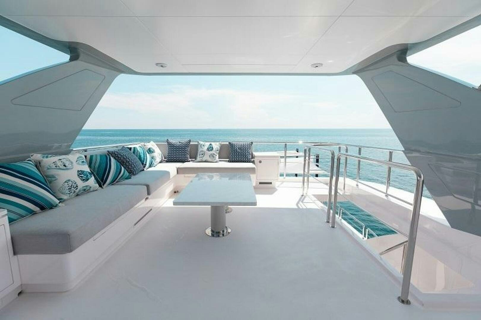a room with a bed and a table aboard WIGGLE ROOM Yacht for Sale