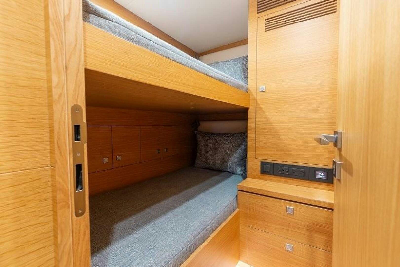 a room with wooden furniture aboard WIGGLE ROOM Yacht for Sale