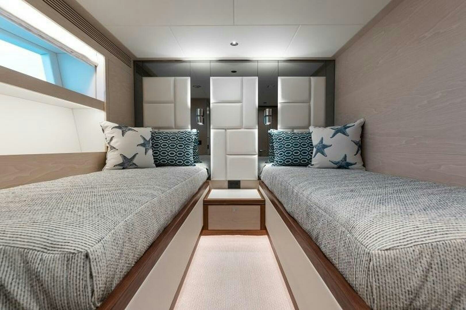 a room with two beds aboard WIGGLE ROOM Yacht for Sale