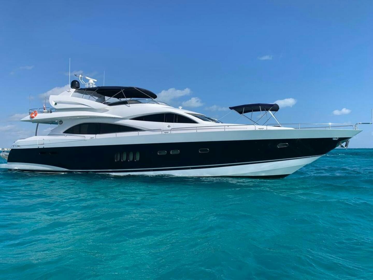a white yacht in the water aboard JULCAN II Yacht for Sale