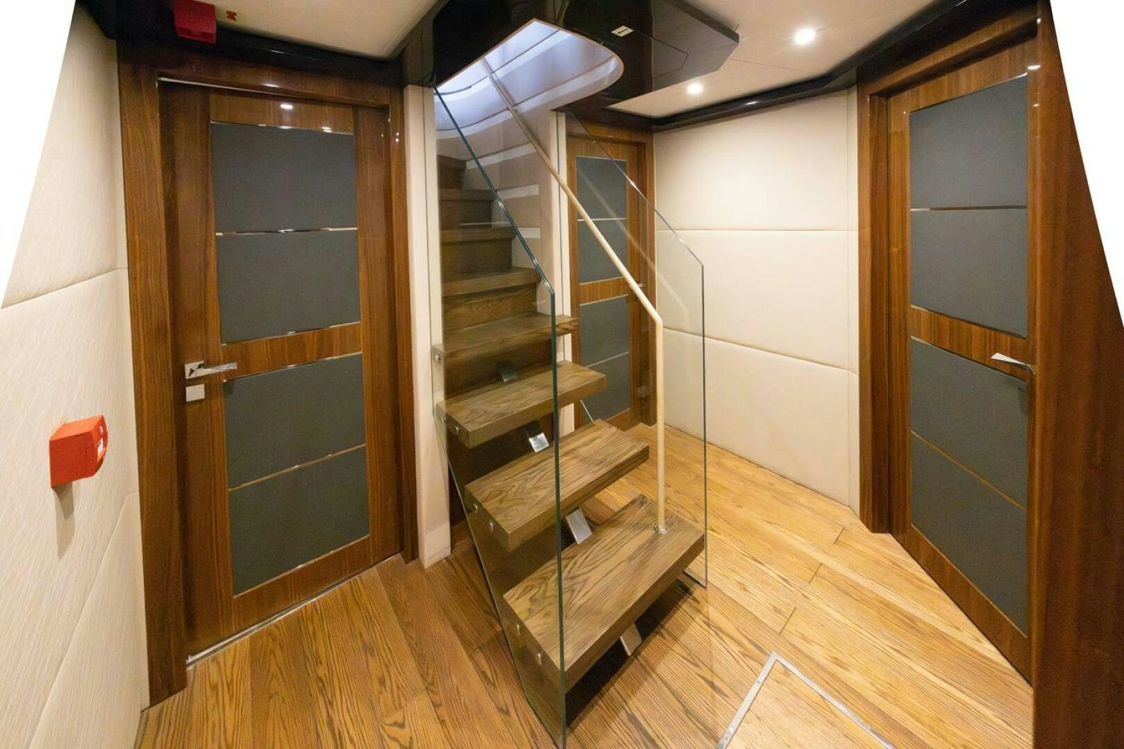 a wooden staircase in a room aboard LADY CAROLINE Yacht for Sale