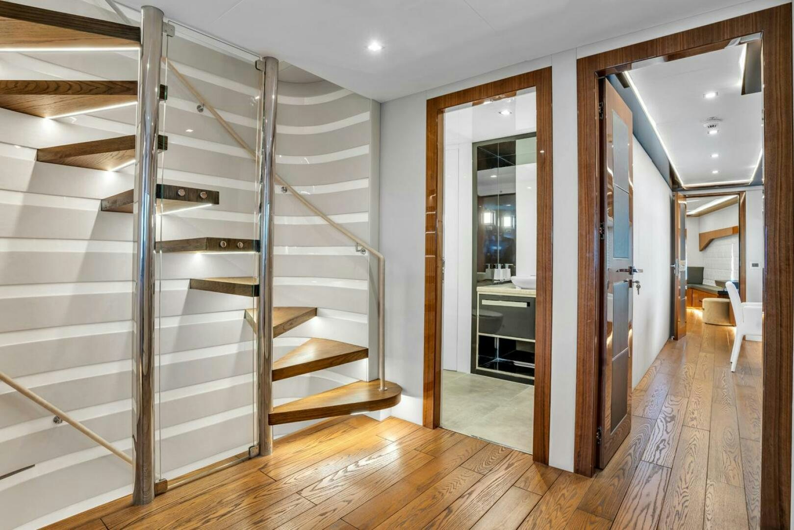 a room with a staircase and a glass door aboard LADY CAROLINE Yacht for Sale