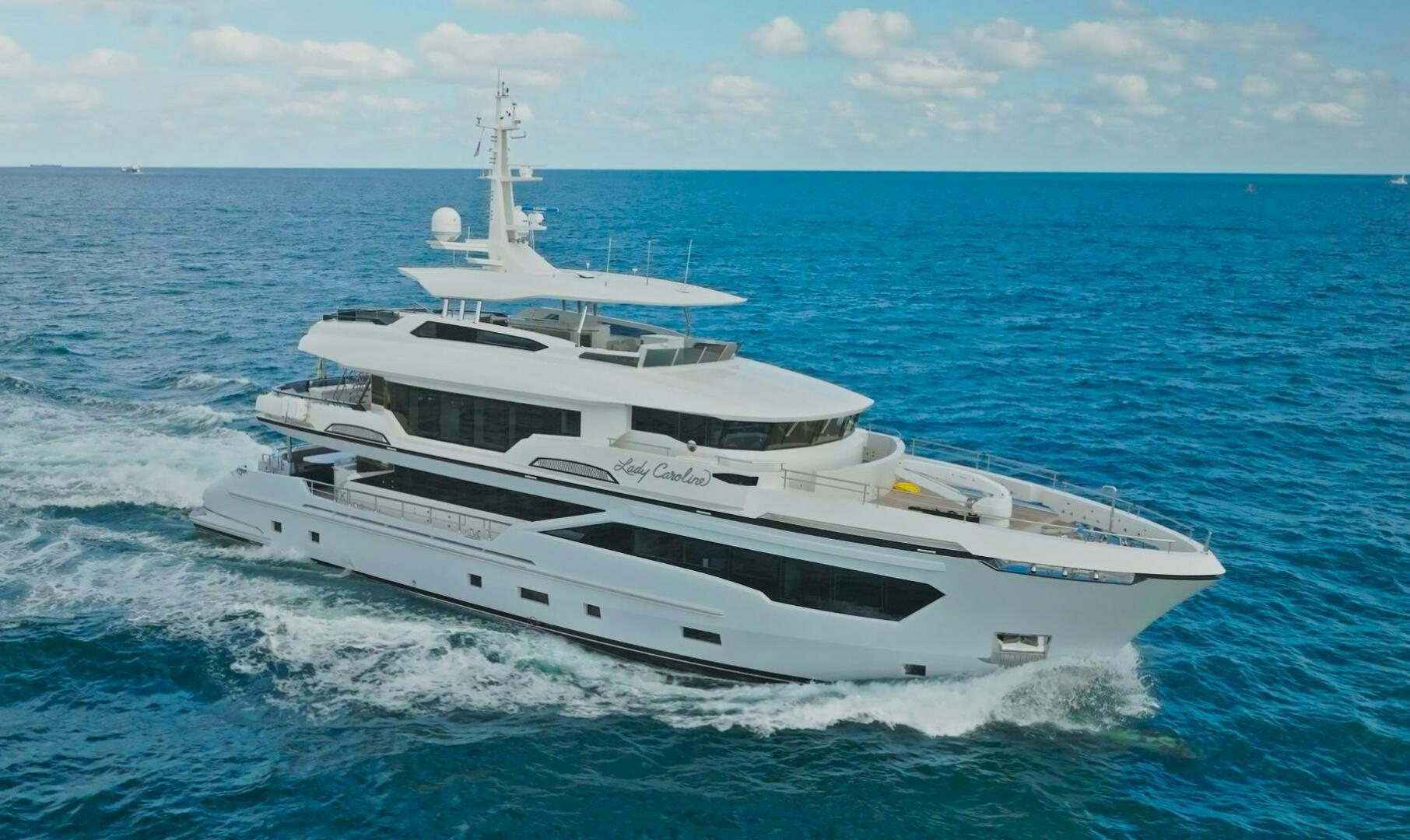 a white yacht in the water aboard LADY CAROLINE Yacht for Sale