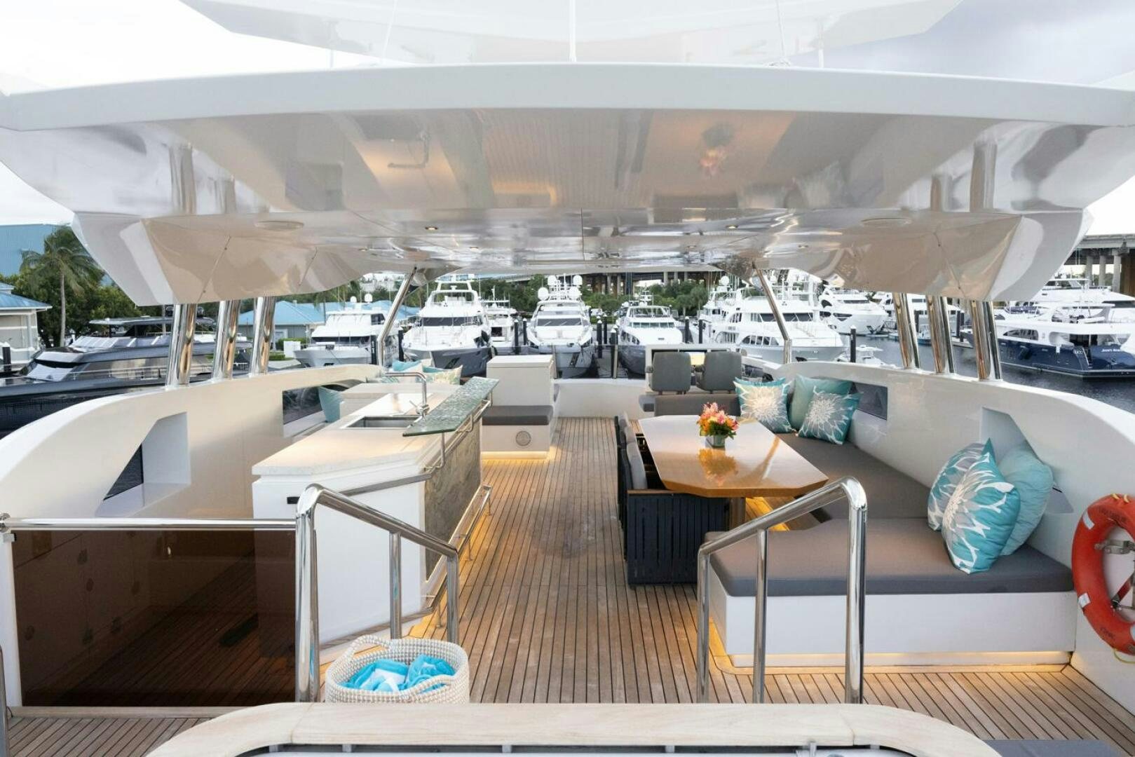 a room with a table and chairs aboard LADY CAROLINE Yacht for Sale