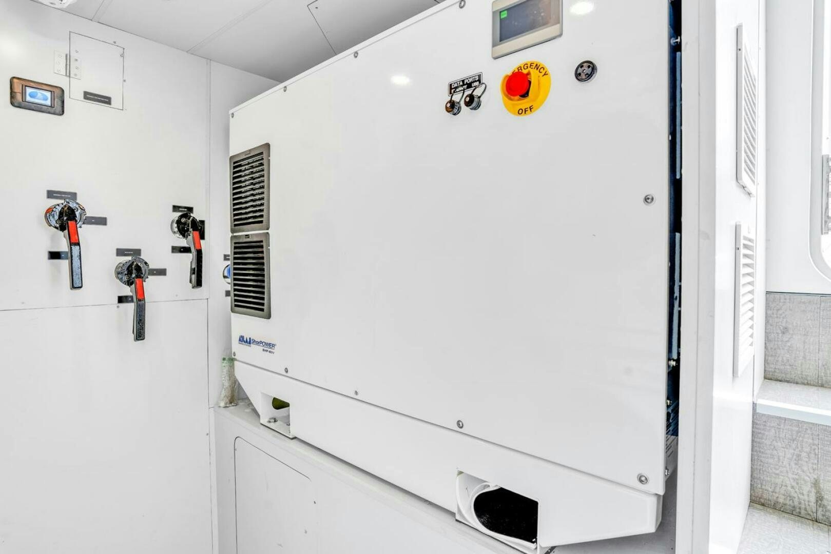 a white cabinet with a few knobs and knobs aboard LADY CAROLINE Yacht for Sale