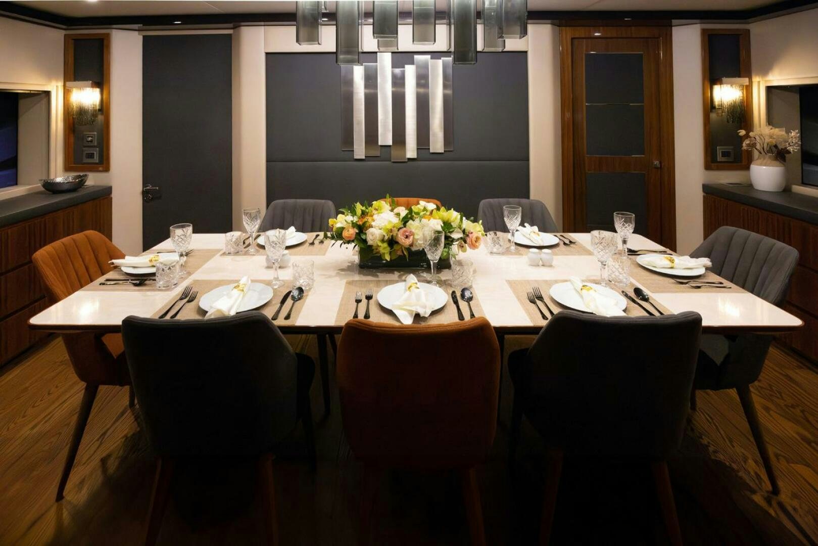 a large dining table with chairs aboard LADY CAROLINE Yacht for Sale