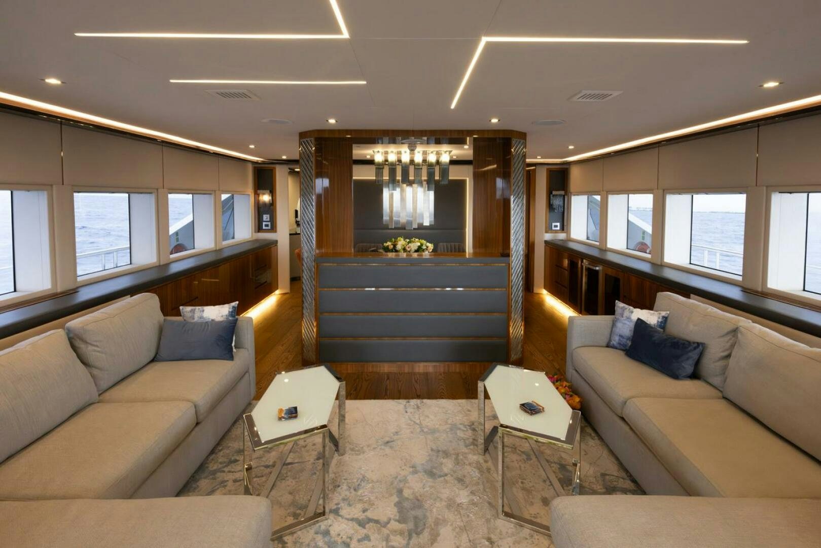 a living room with a staircase aboard LADY CAROLINE Yacht for Sale