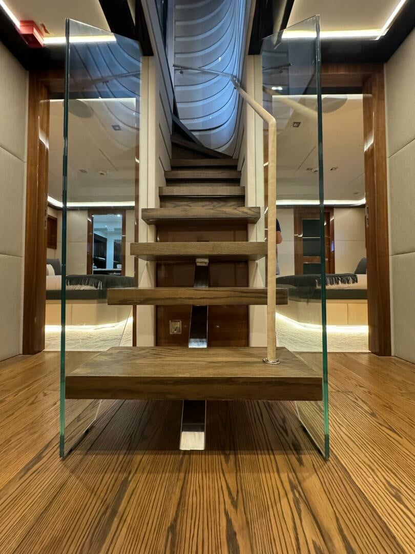 a set of stairs in a room aboard LADY CAROLINE Yacht for Sale