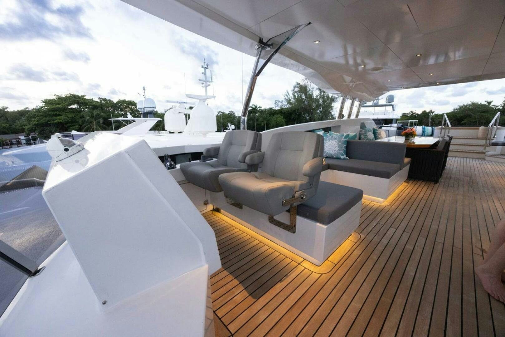 a large living room with a large patio area aboard LADY CAROLINE Yacht for Sale