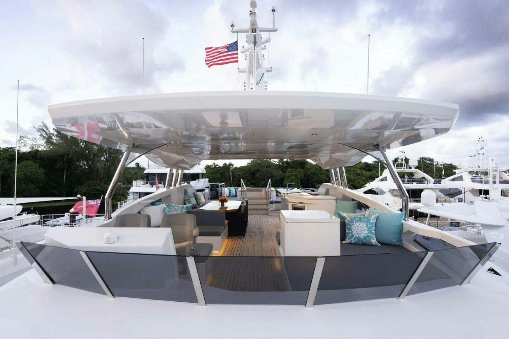 a large military ship docked aboard LADY CAROLINE Yacht for Sale