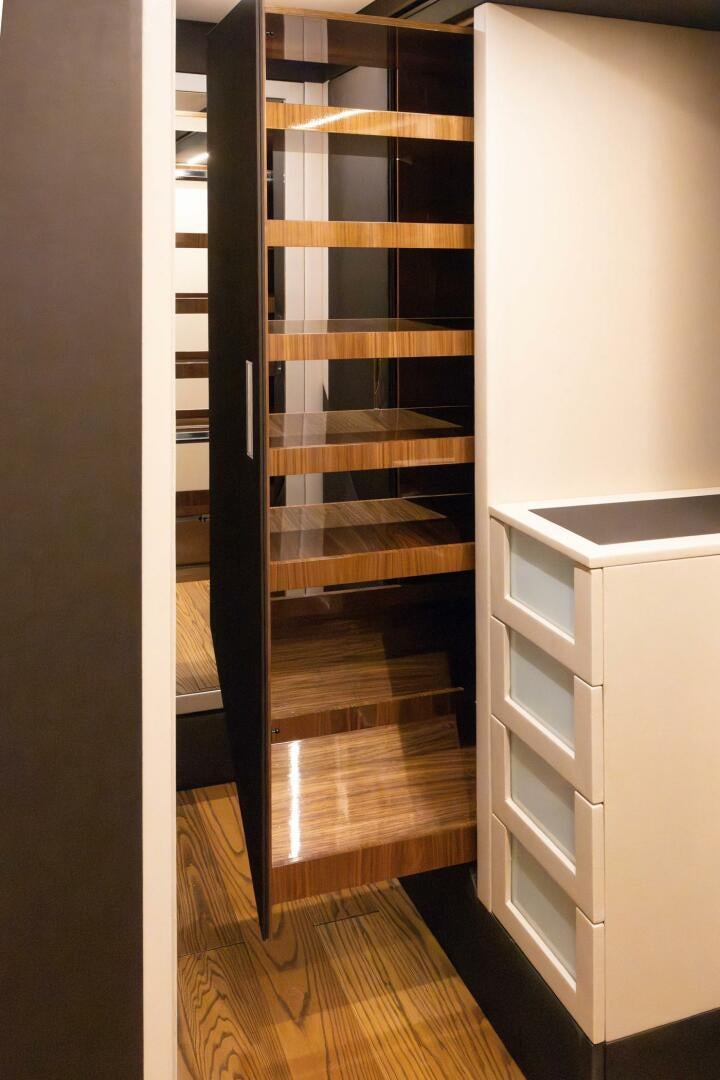 a closet with a door aboard LADY CAROLINE Yacht for Sale