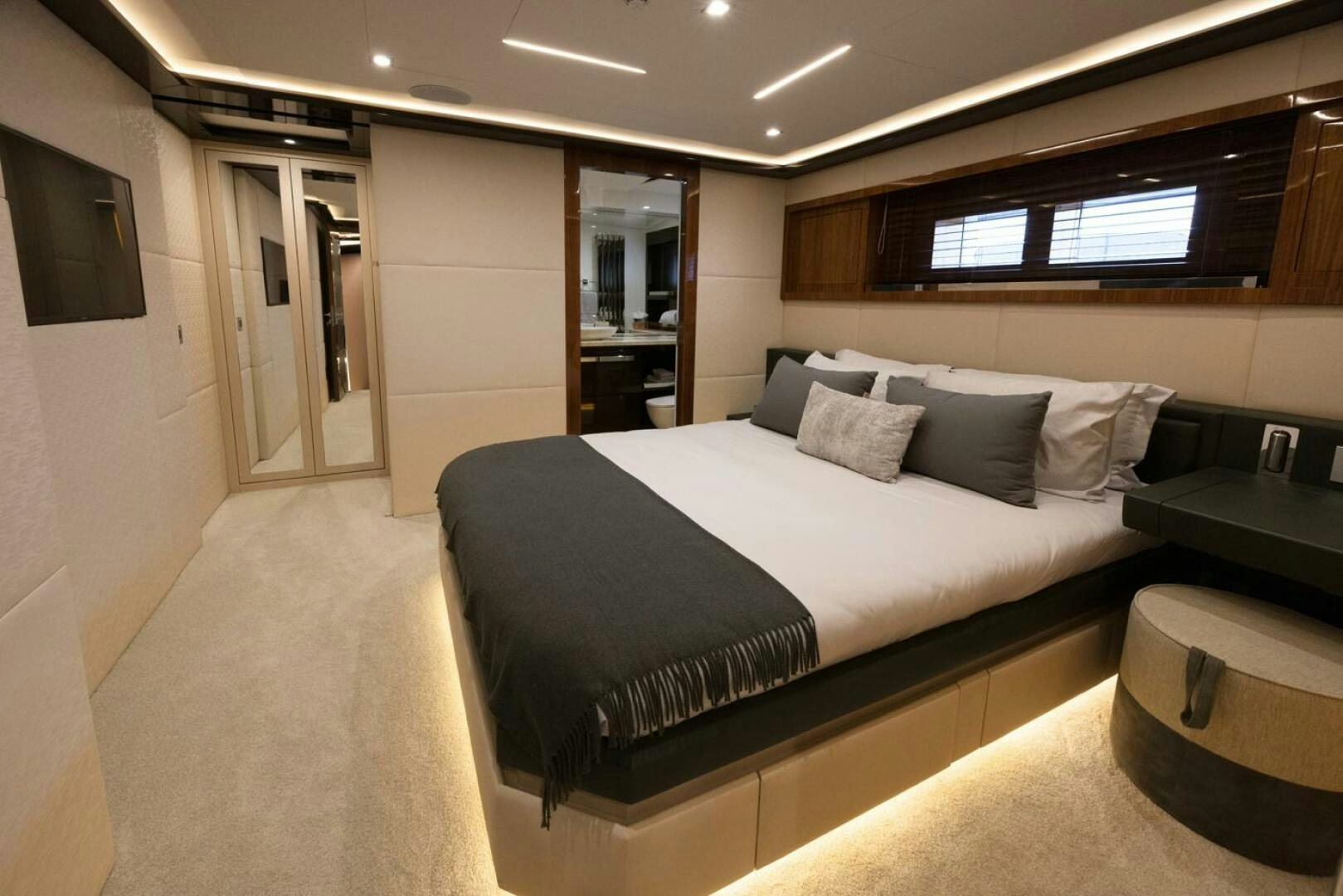 a large bed in a room aboard LADY CAROLINE Yacht for Sale