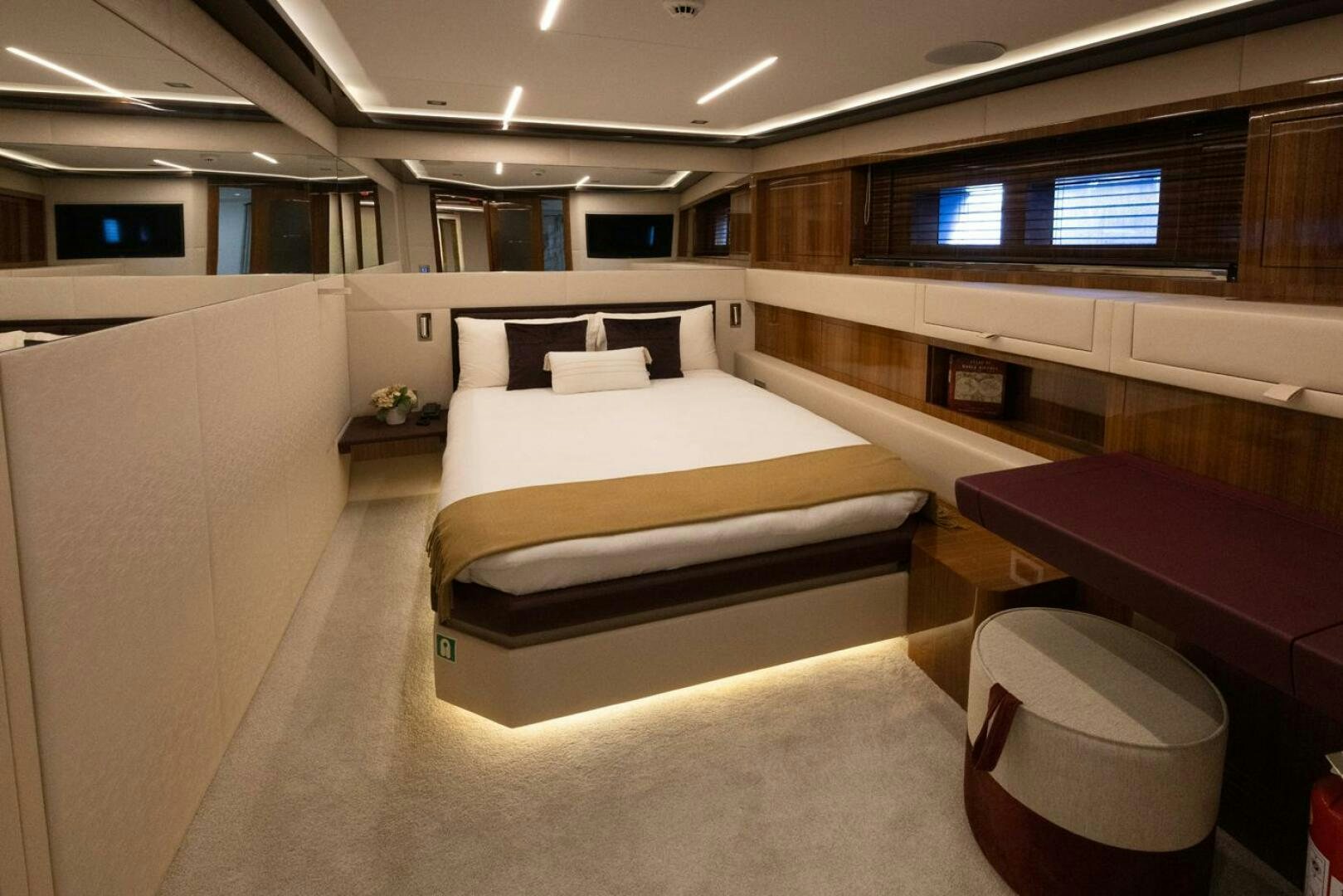 a room with a bed and a tv aboard LADY CAROLINE Yacht for Sale