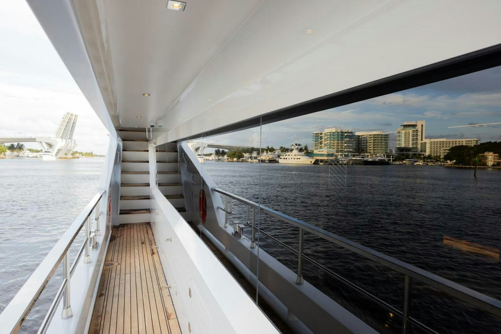 a large body of water with a bridge and a city in the background aboard LADY CAROLINE Yacht for Sale