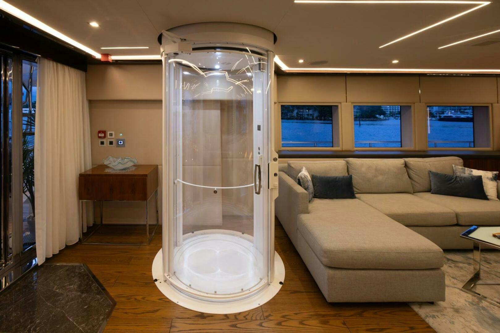 a large glass door in a room aboard LADY CAROLINE Yacht for Sale