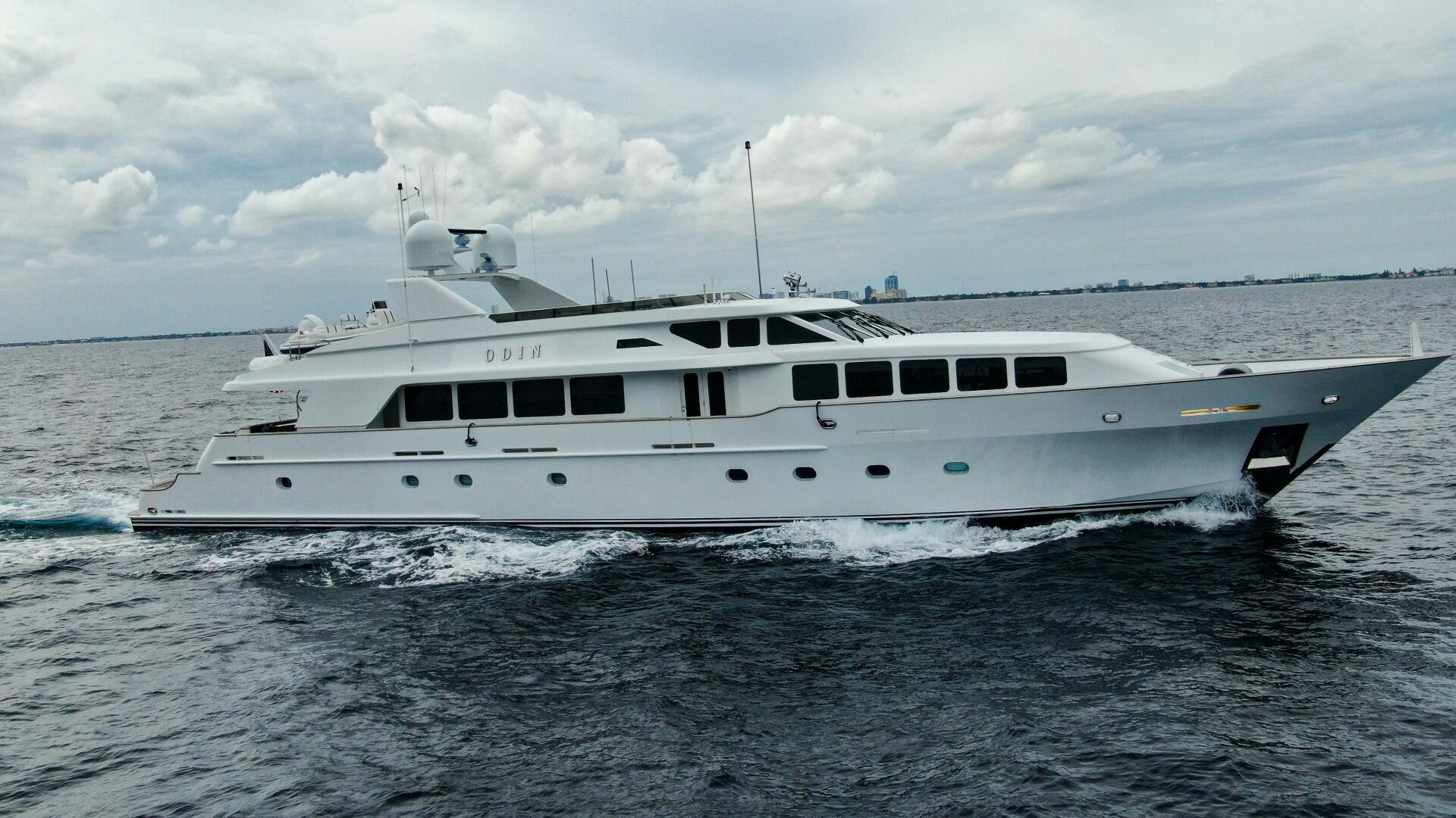 a white yacht in the water aboard ODIN Yacht for Sale
