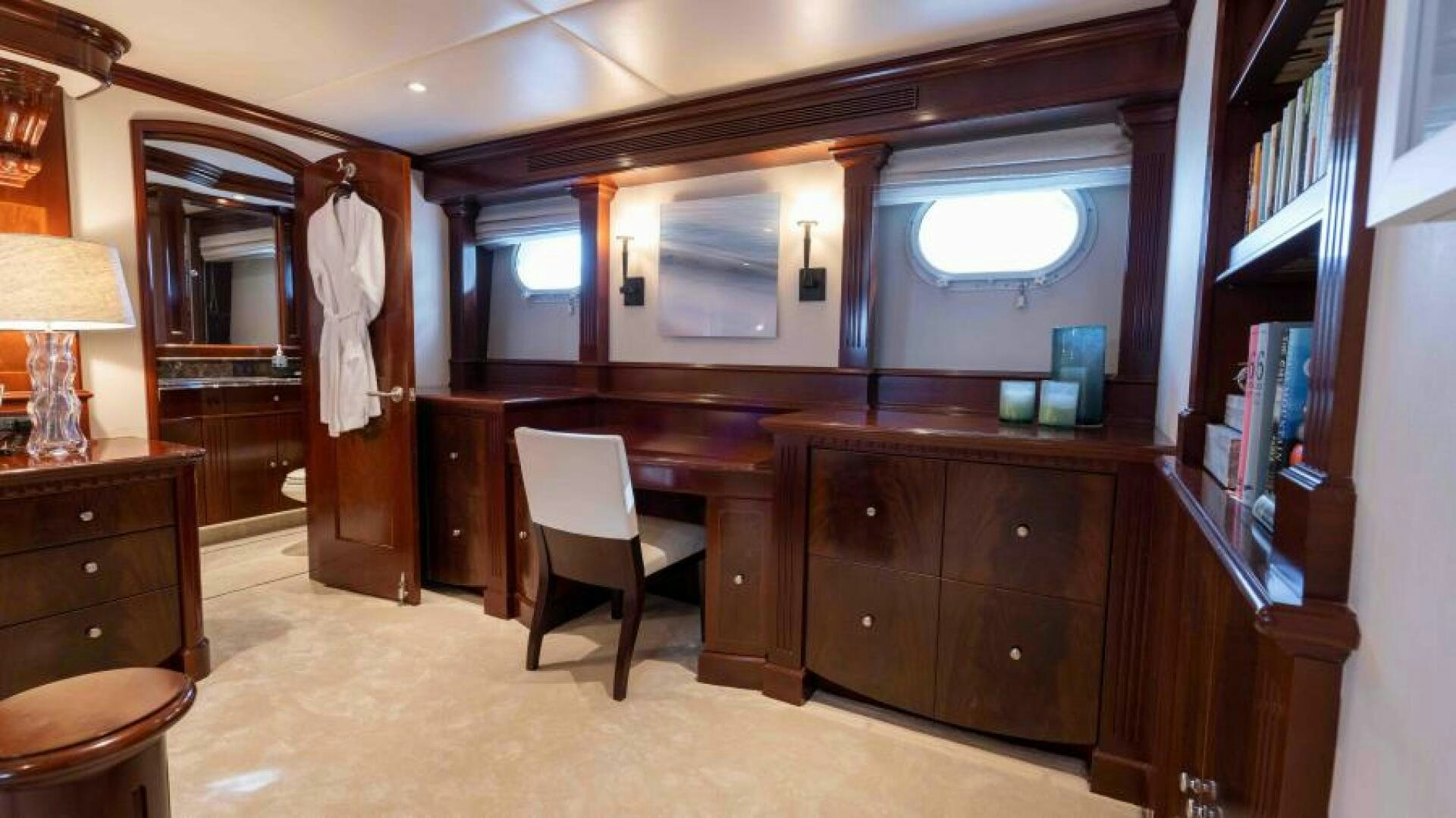 a room with a desk and a chair aboard ODIN Yacht for Sale