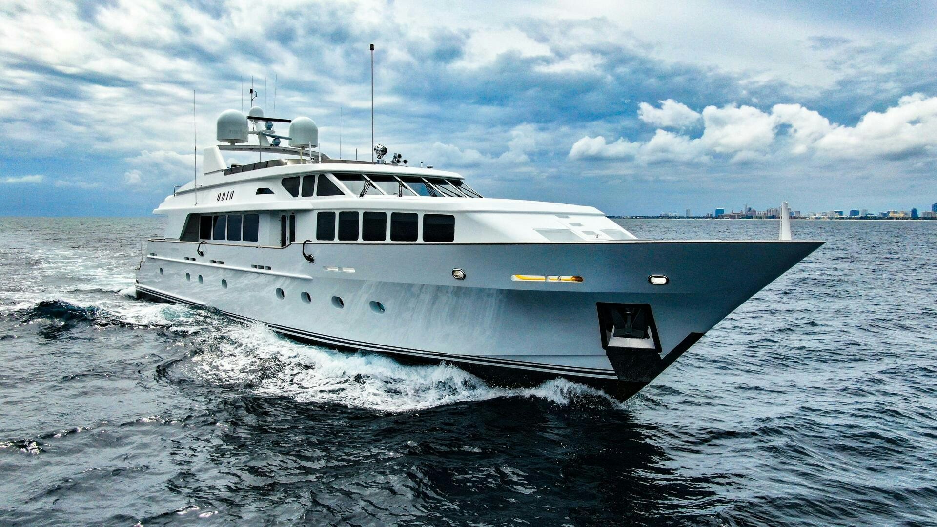 a white yacht in the water aboard ODIN Yacht for Sale