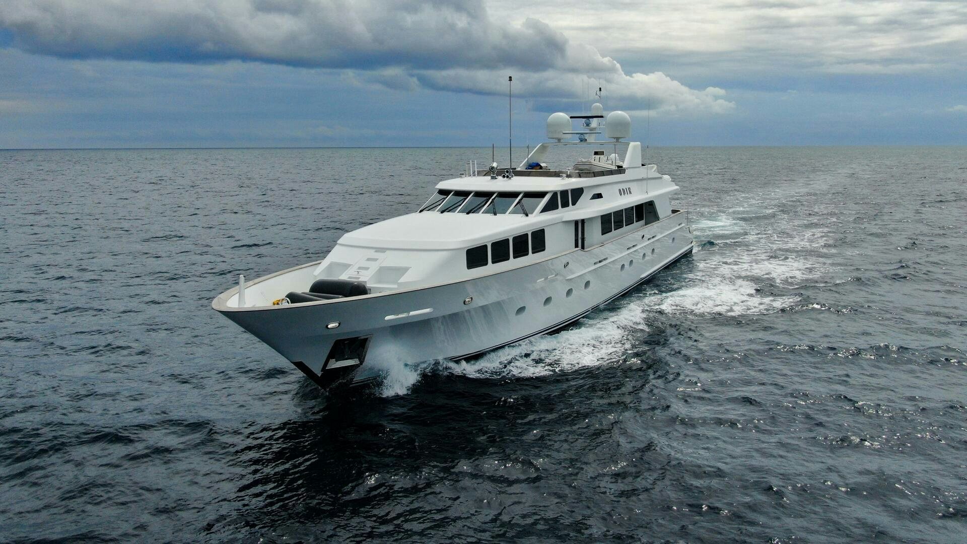 a white yacht in the water aboard ODIN Yacht for Sale