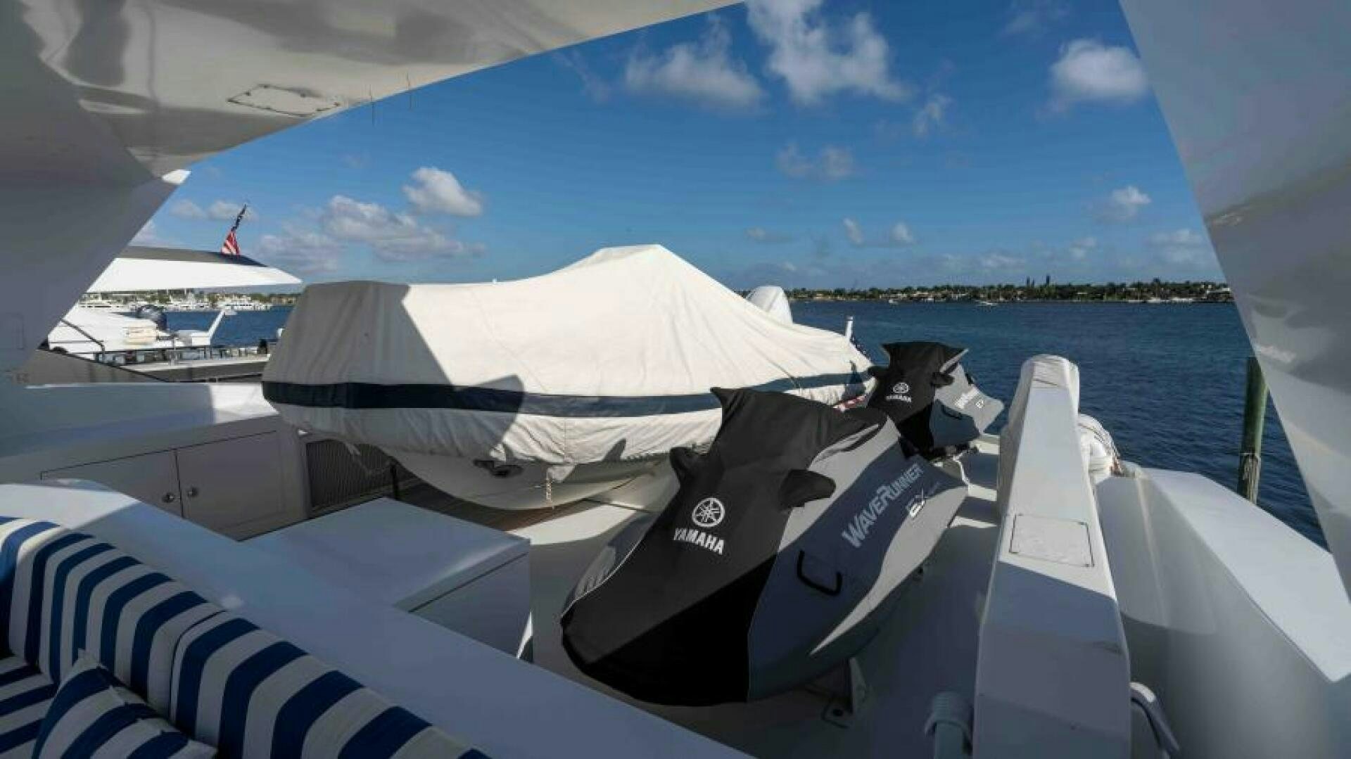 a group of boats on a body of water aboard ODIN Yacht for Sale