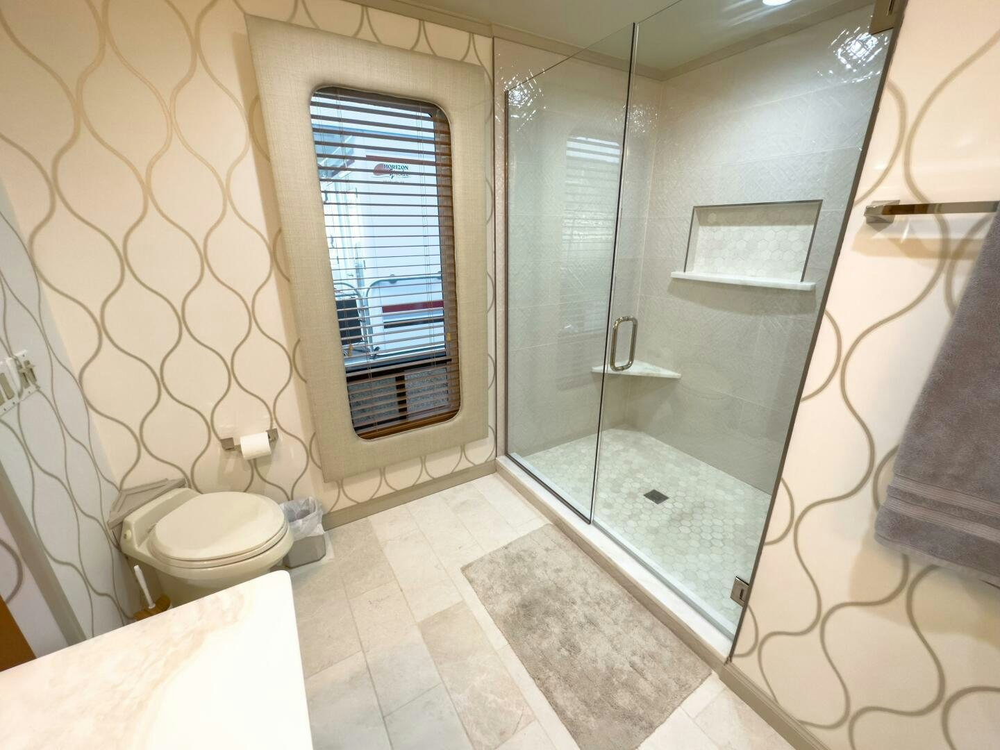 a bathroom with a glass shower aboard SUNSTAR Yacht for Sale