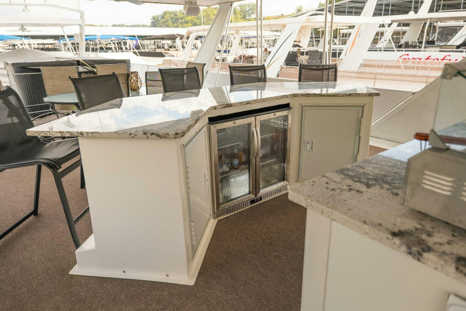 a room with computers and chairs aboard SUNSTAR Yacht for Sale