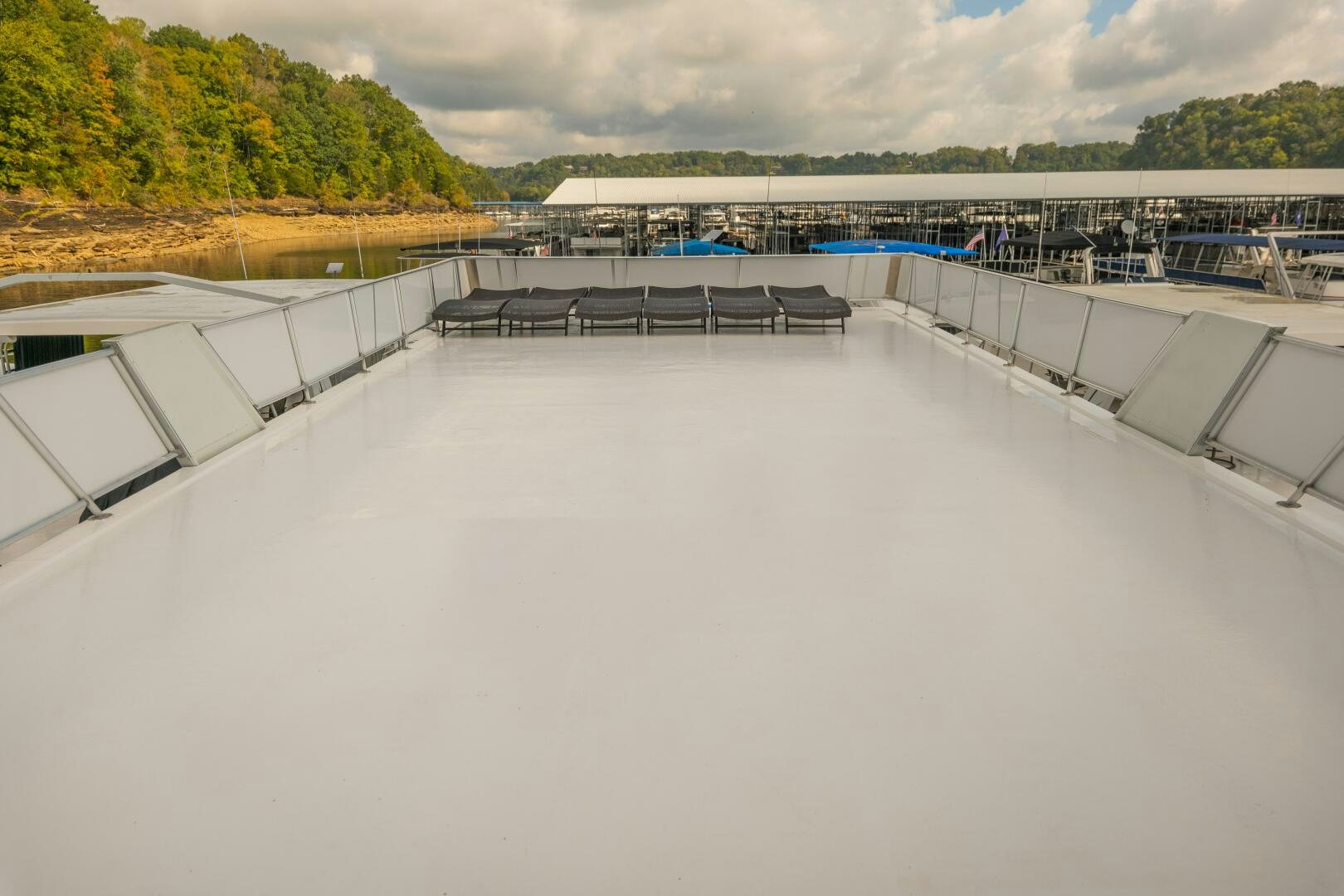 a large white building with a balcony aboard SUNSTAR Yacht for Sale