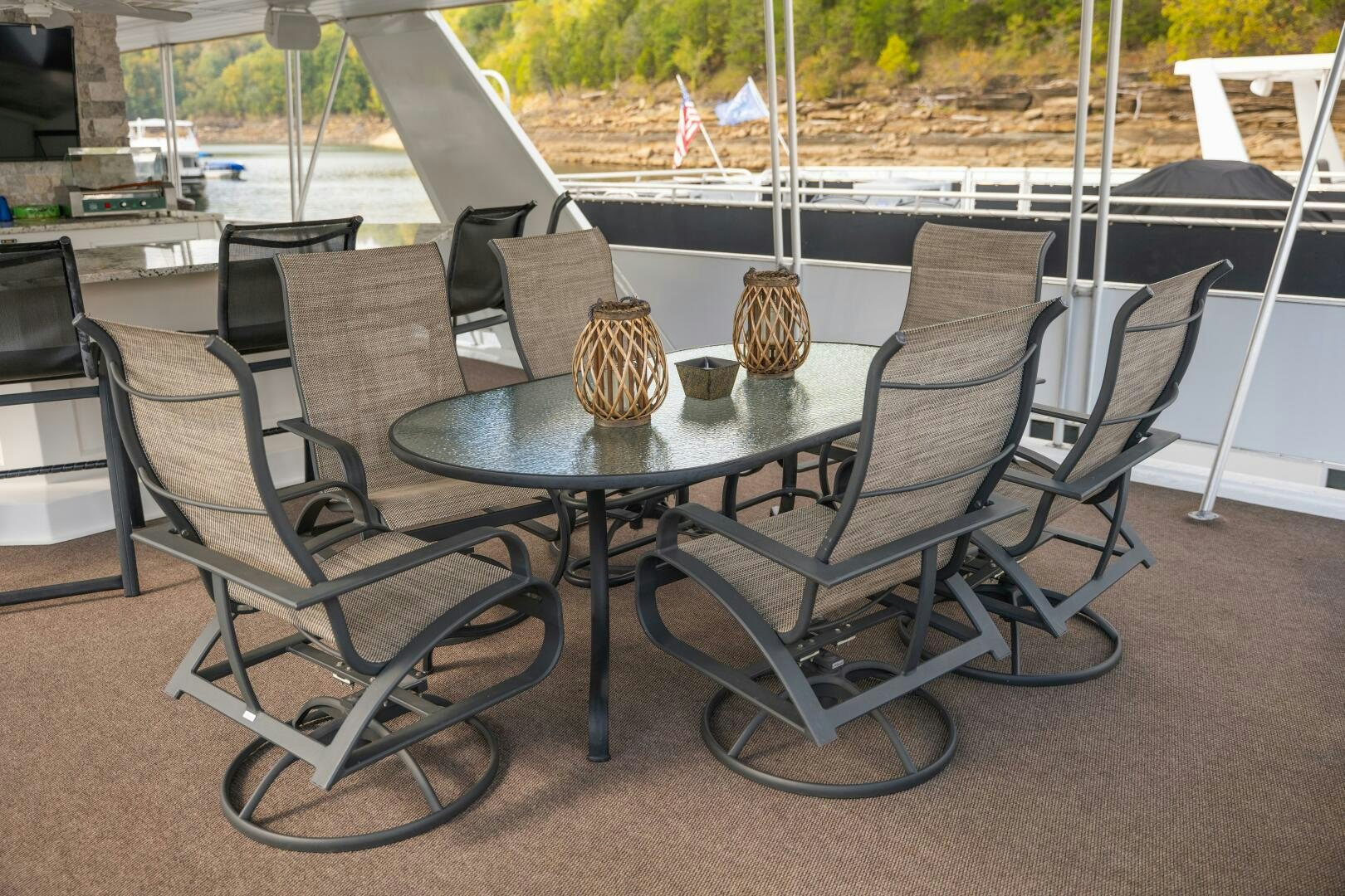 a table with chairs around it aboard SUNSTAR Yacht for Sale