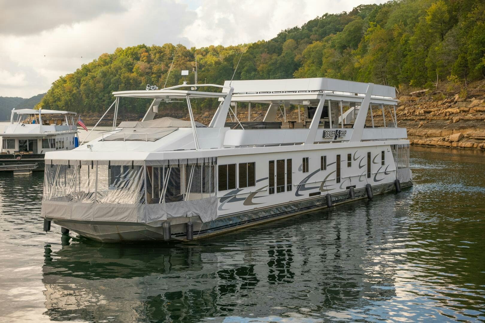 a white boat on the water aboard SUNSTAR Yacht for Sale