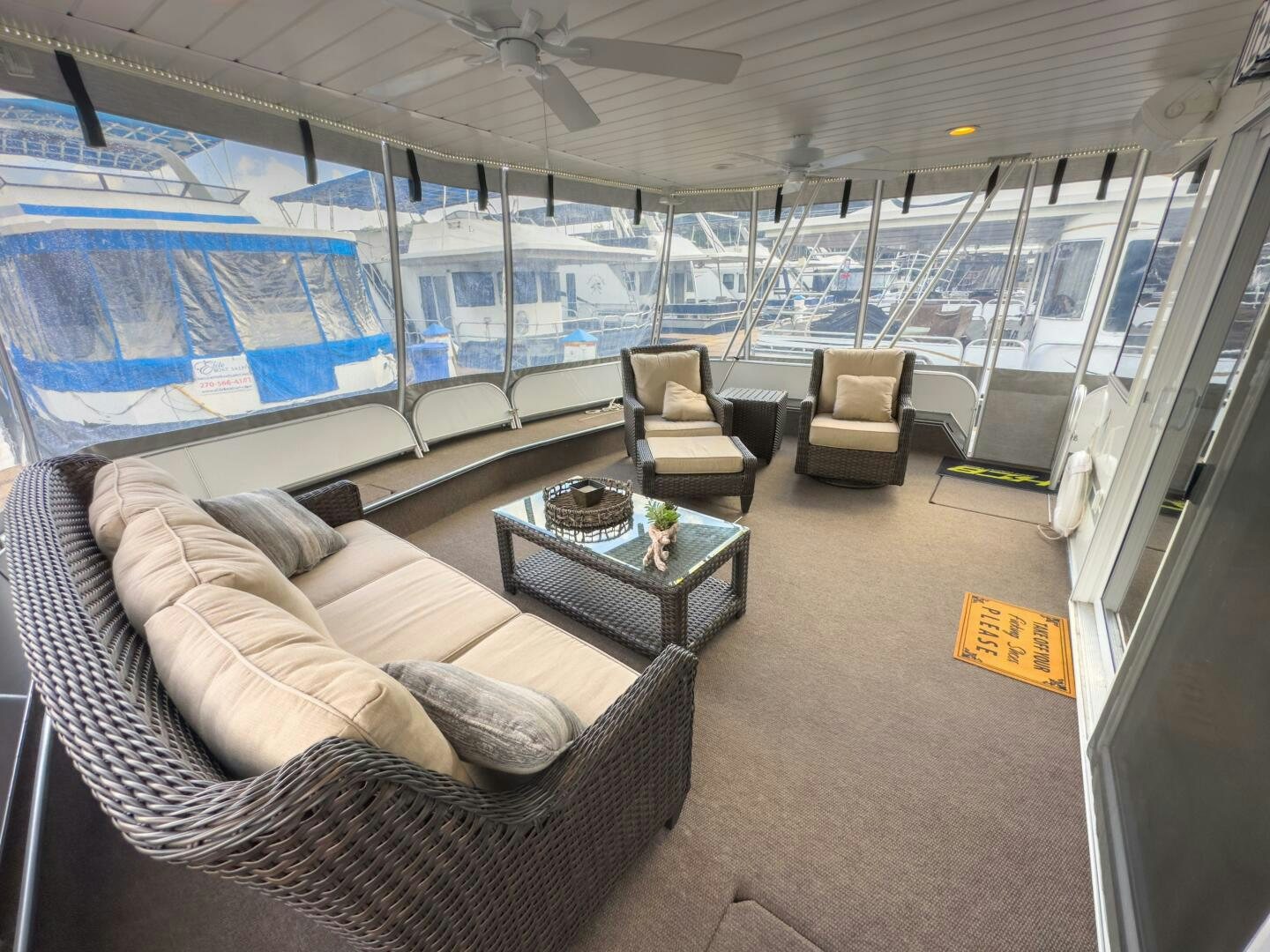 a room with a couch and a table aboard SUNSTAR Yacht for Sale