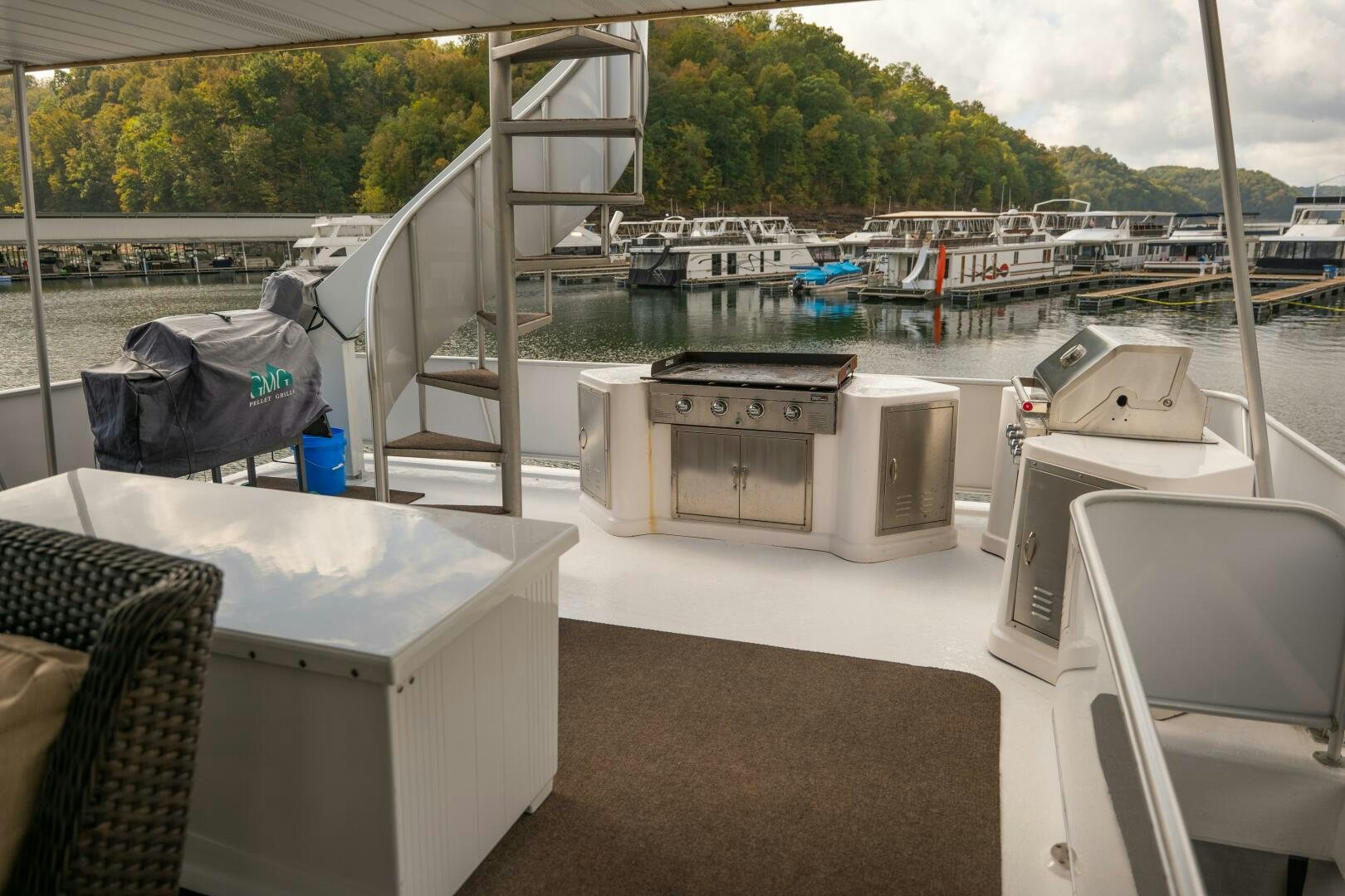 a boat dock with a boat in the water aboard SUNSTAR Yacht for Sale