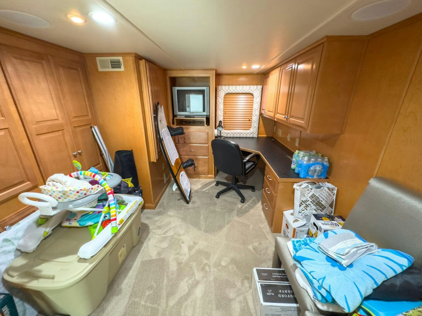 a room with a couch and a table and chairs aboard SUNSTAR Yacht for Sale