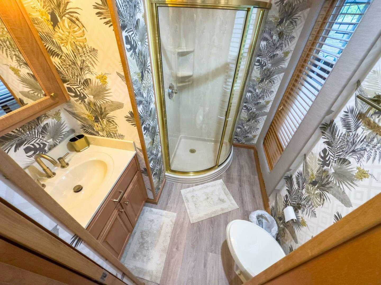 a bathroom with a shower and sink aboard SUNSTAR Yacht for Sale