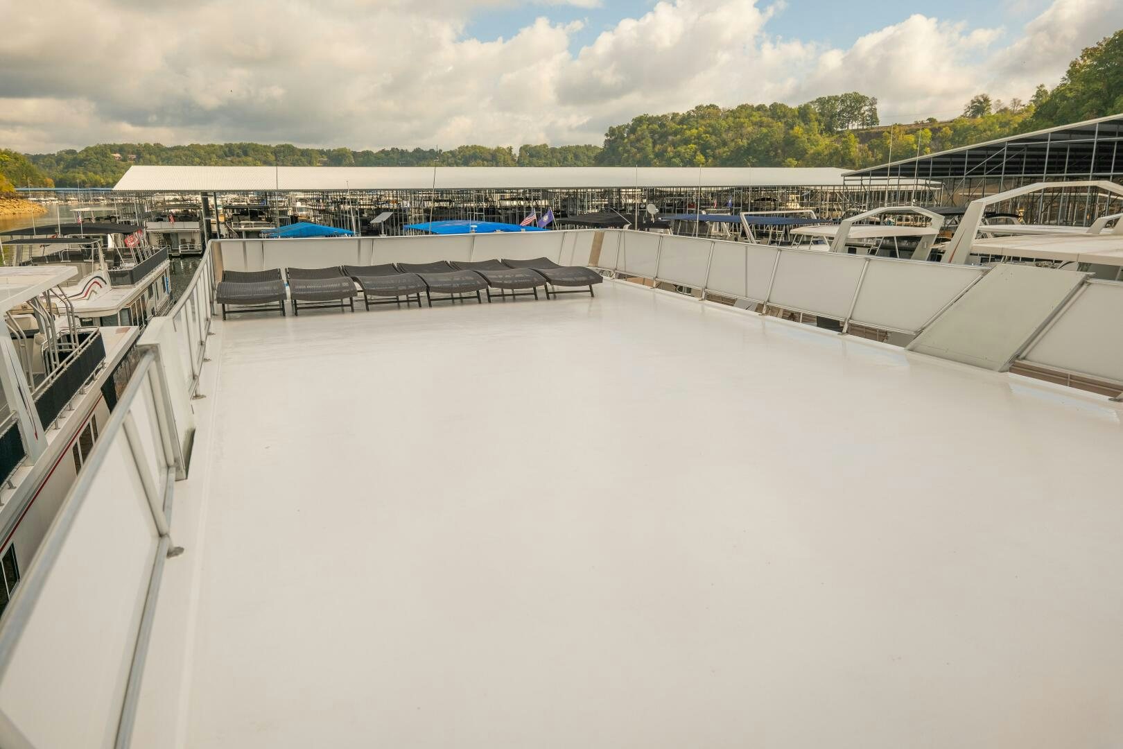 a large white building with a balcony aboard SUNSTAR Yacht for Sale