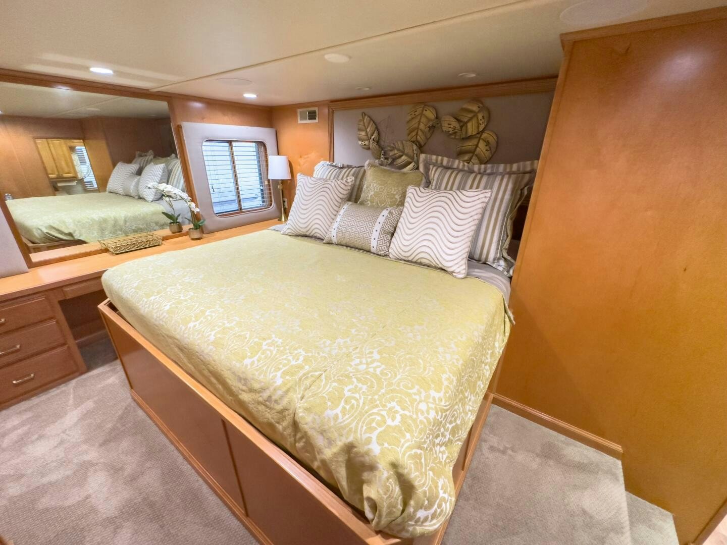 a bedroom with two beds aboard SUNSTAR Yacht for Sale