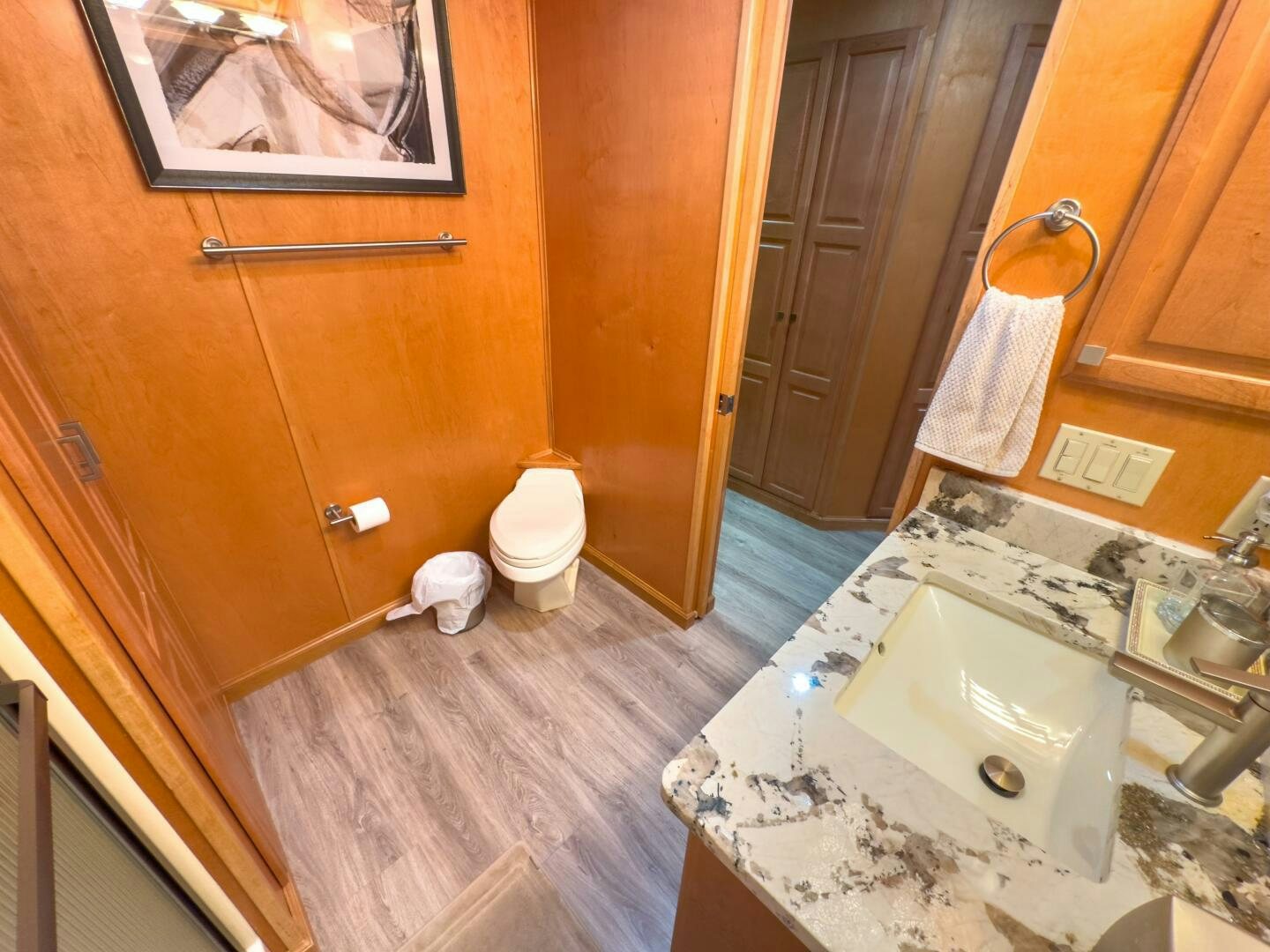 a bathroom with a tub sink and toilet aboard SUNSTAR Yacht for Sale