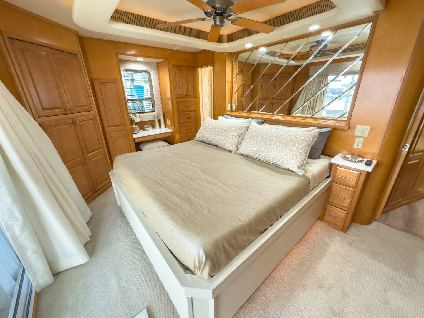a bed in a room aboard SUNSTAR Yacht for Sale