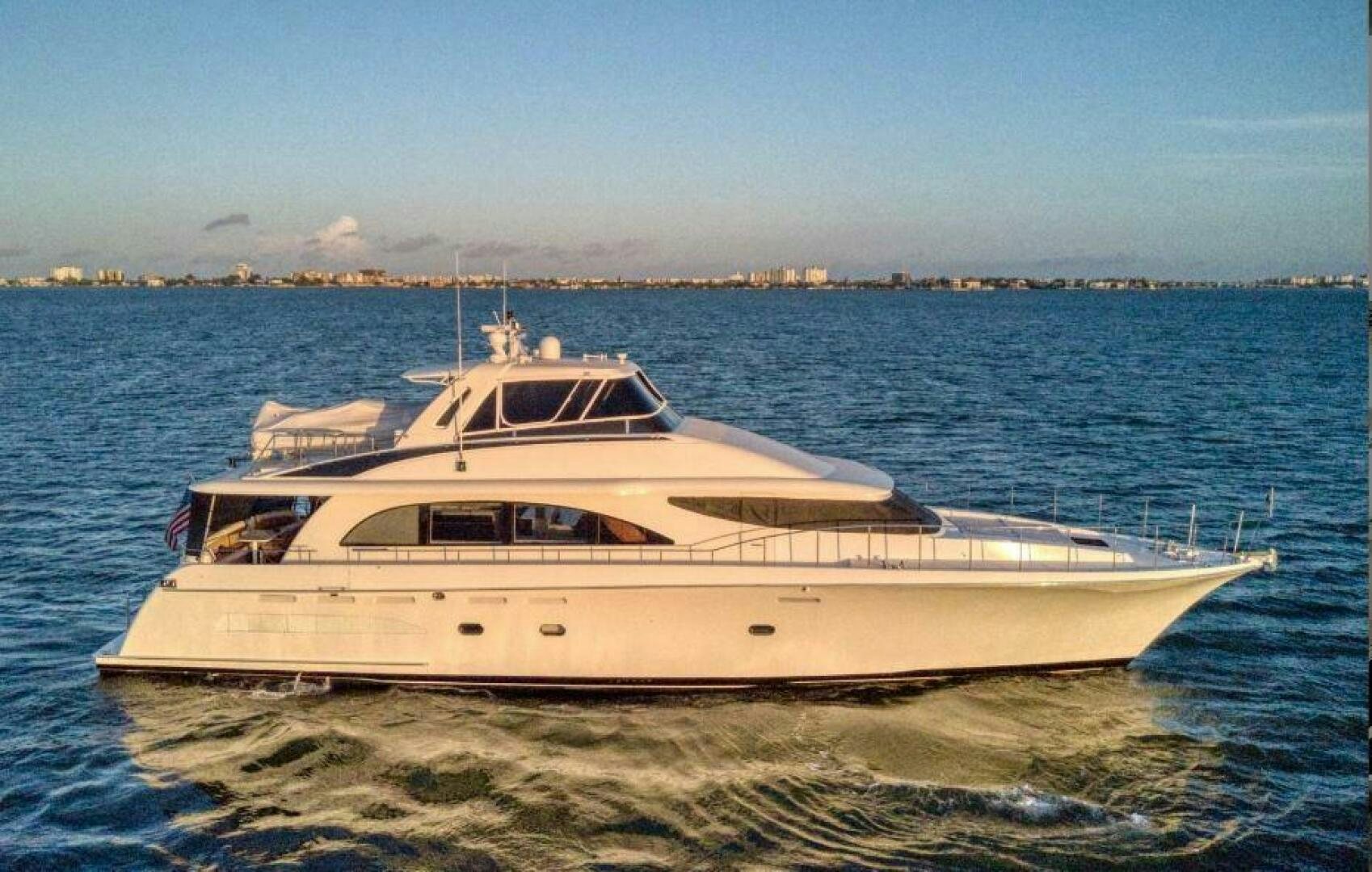 a white boat in the water aboard CHASER - BEING OFFERED ON A 50% PARTNERSHIP BASIS Yacht for Sale
