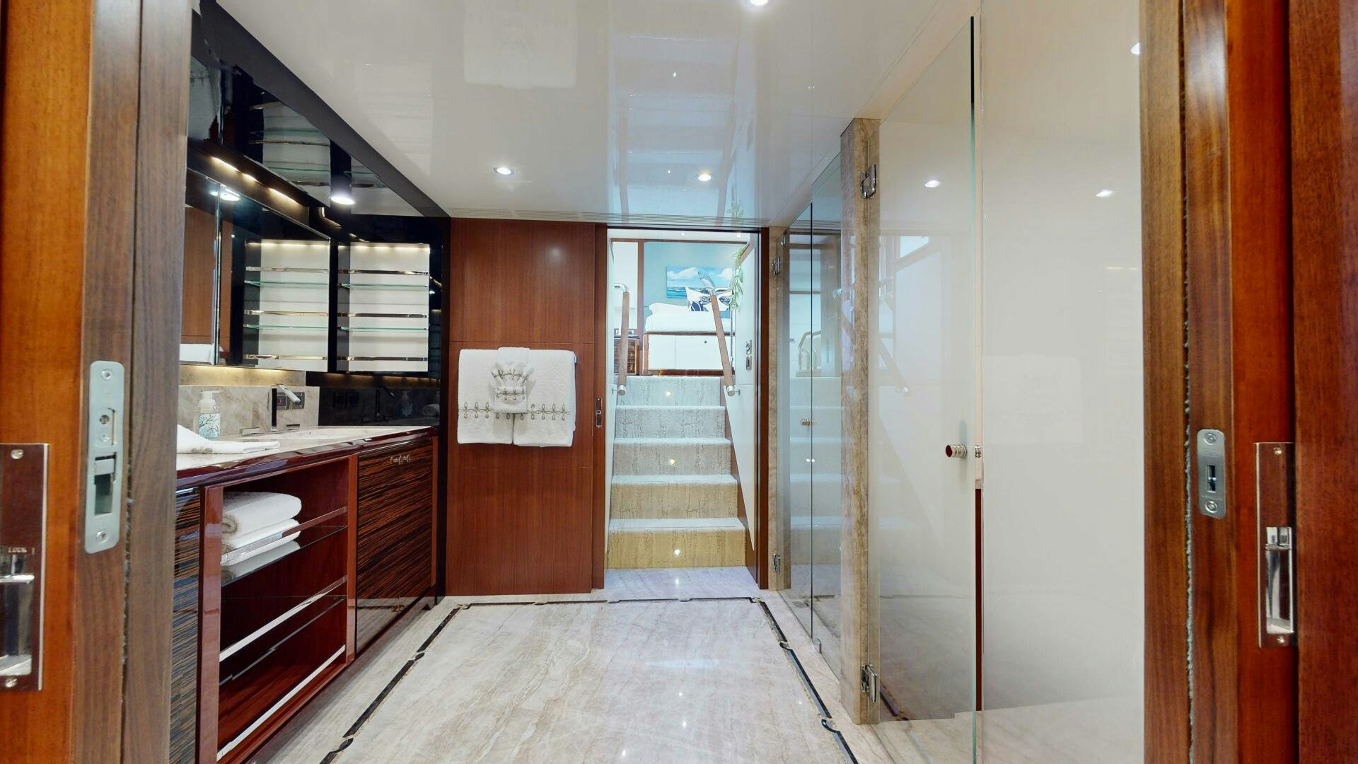 a room with wooden doors aboard DRINKABILITY Yacht for Sale