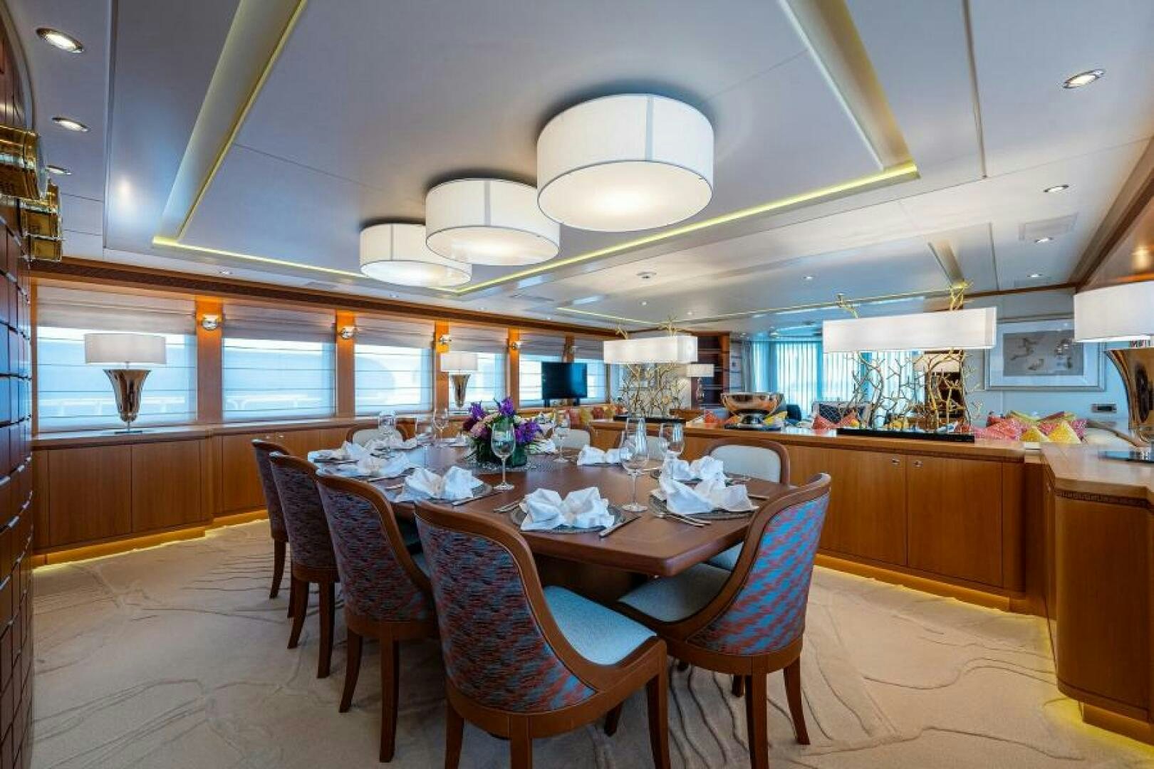 a large kitchen with a dining table aboard CASTLEFINN Yacht for Sale