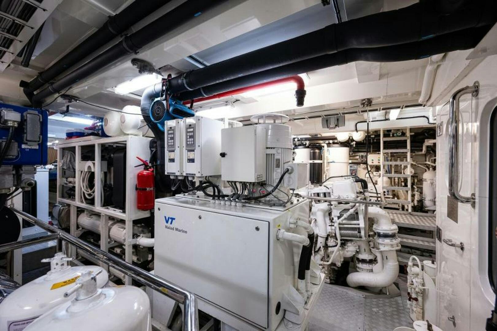 a large white machine with blue lights aboard CASTLEFINN Yacht for Sale