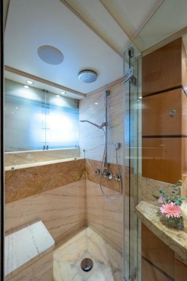 a bathroom with a shower aboard CASTLEFINN Yacht for Sale